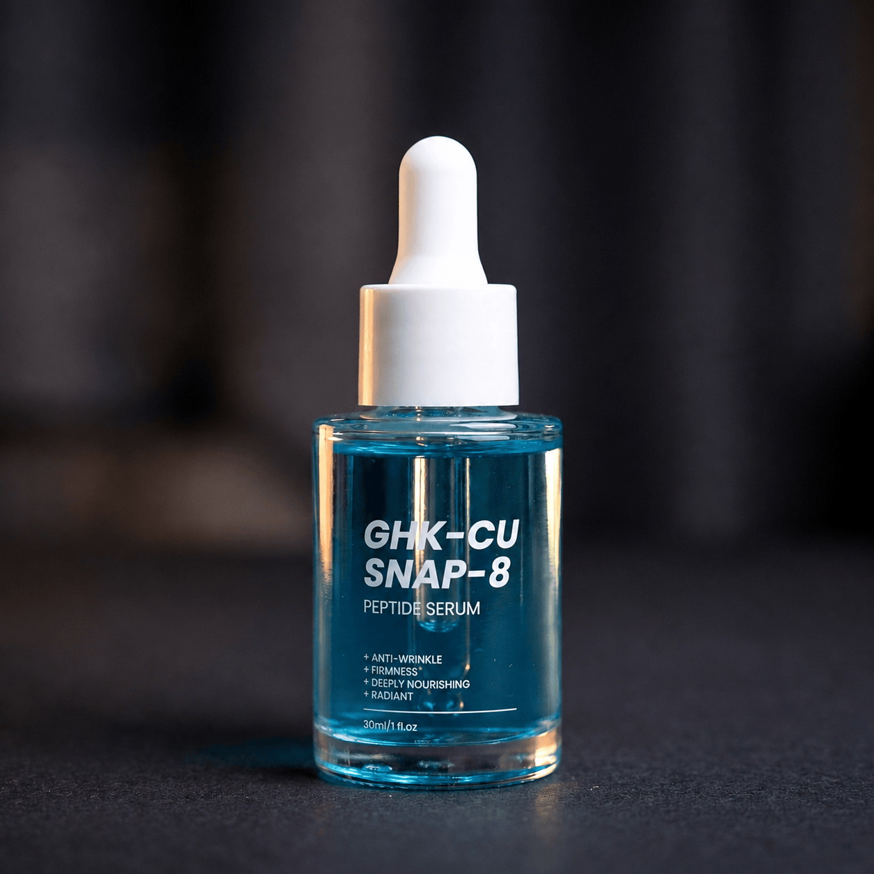 GHK-Cu SNAP-8 Peptide Serum 30 mL glass dropper bottle, dark moody studio background, front label view